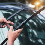 Mechanic Replace Windshield Wipers On Car. Replacing Wiper Blade